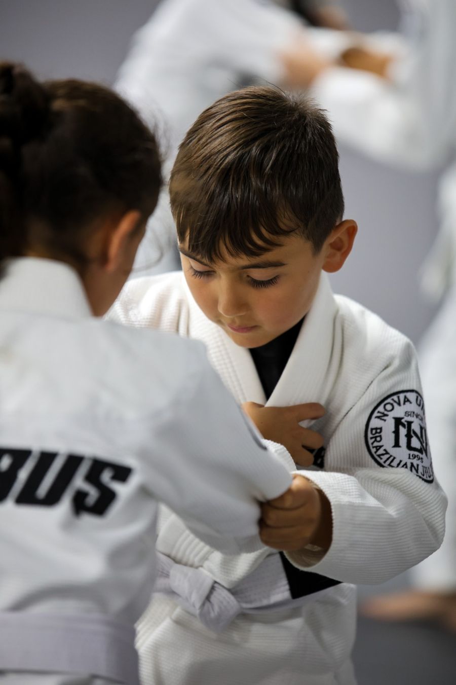 A teen training no-gi grappling at Brabus Academy
