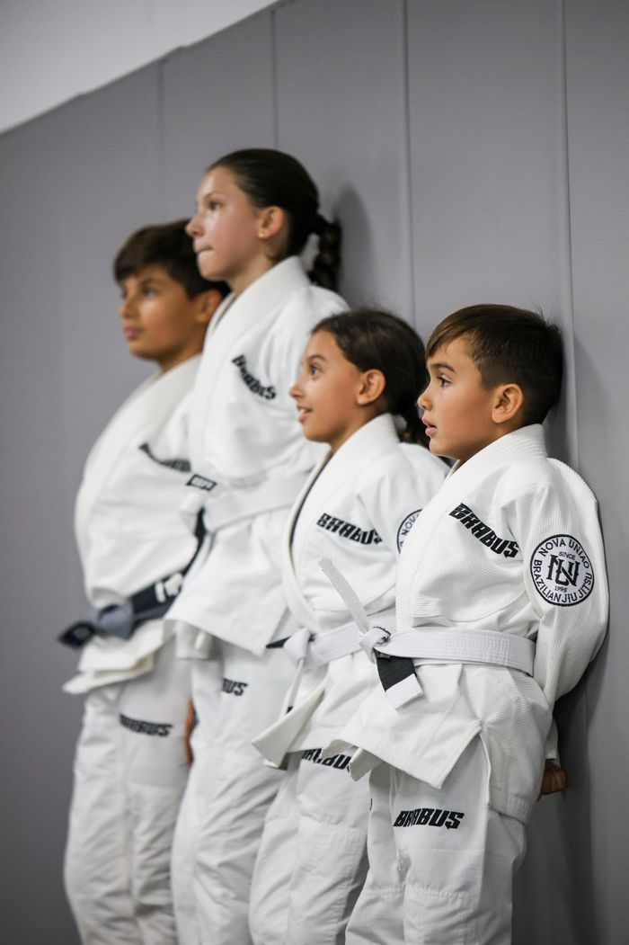 Four young Brabus Academy students lined up in their gis